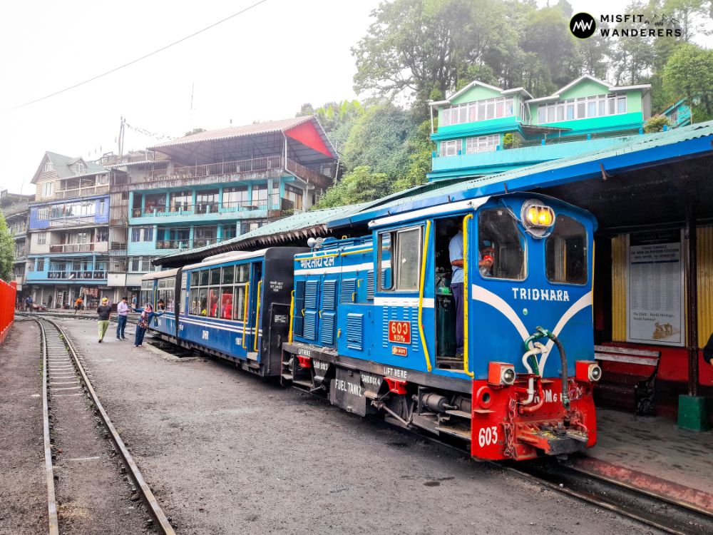 A diesel engine toy train standing at Ghum — Darjeeling Himalayan Railway Guide