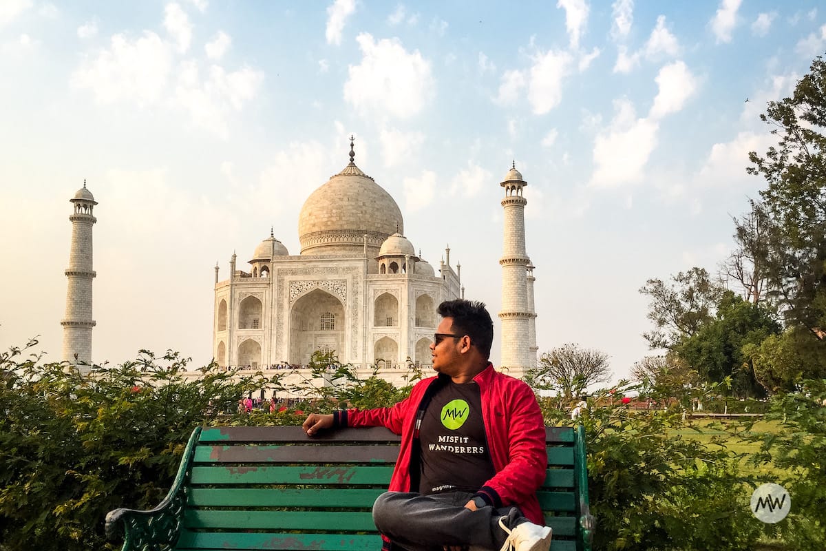 VivaciousVipin sitting and posing in front of the taj mahal virtual tour