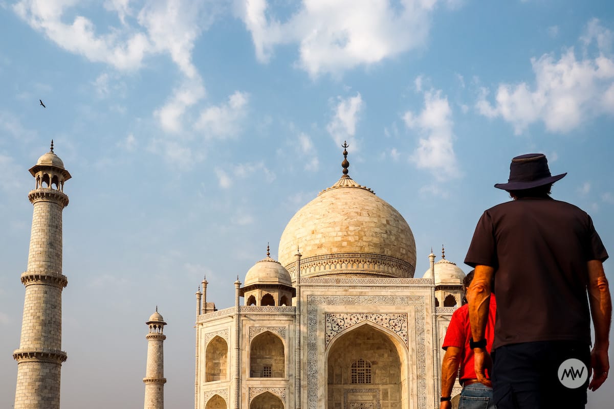 an oldman cowboy looking the dome at taj mahal virtual tour