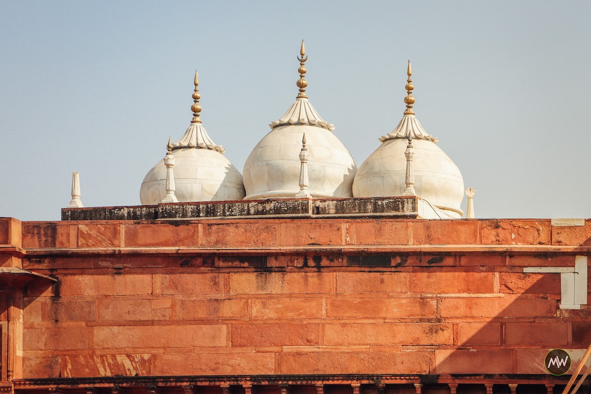 The domes of Nagina Mosque as seen from the open ground of Diwan-e-Aam