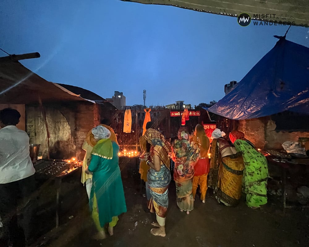 Women lighning lamps in front of Samadhi Wale Baba Ji - Mehandipur Balaji Temple