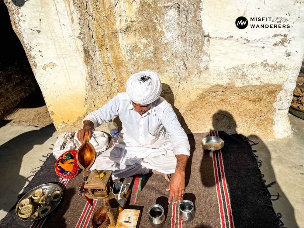 A local Bishnoi making hukka/weed — Jodhpur Places to Visit | Misfit Wanderers